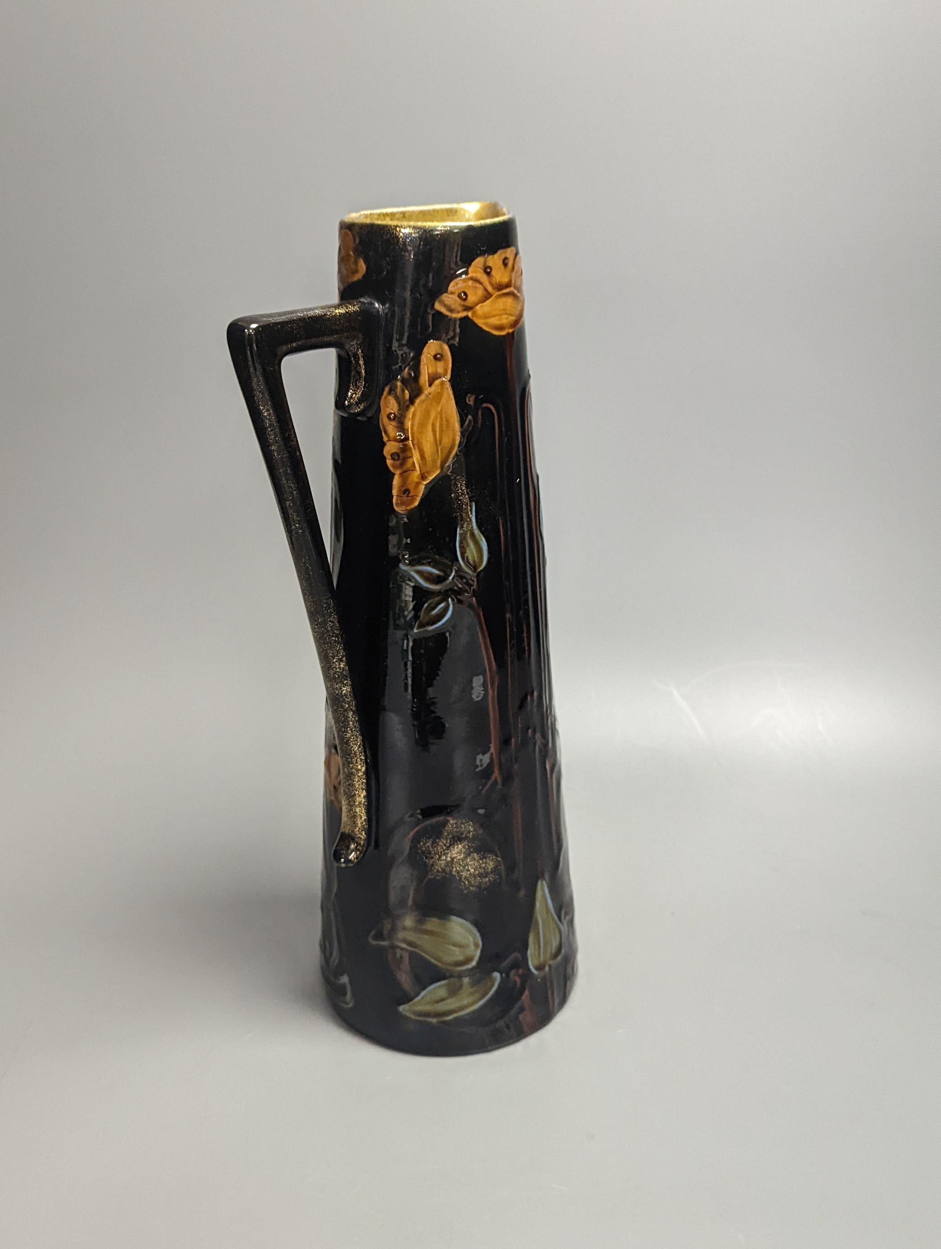 An Art Nouveau earthenware tapering jug, height 30cm